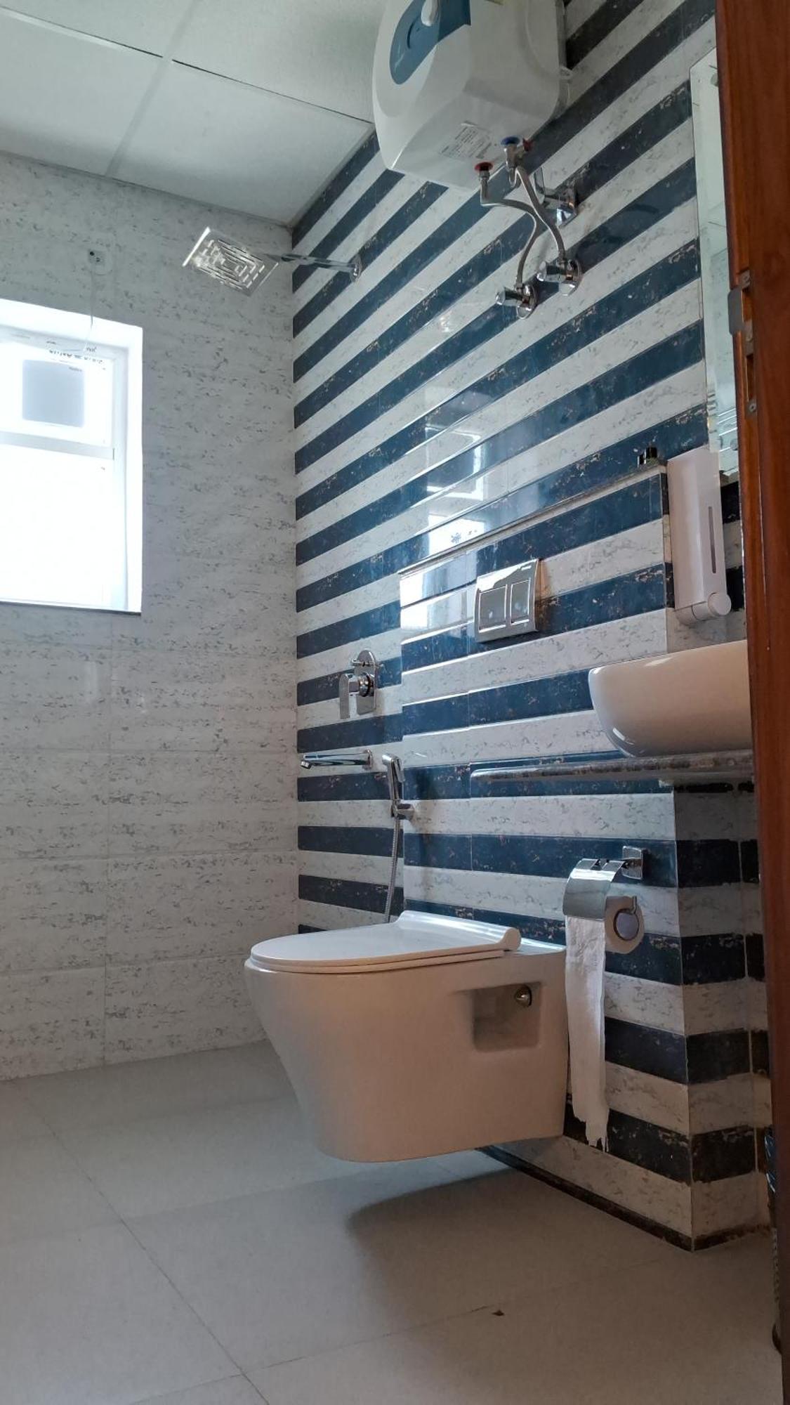 Emerald Suites Grander Noida Quarto foto